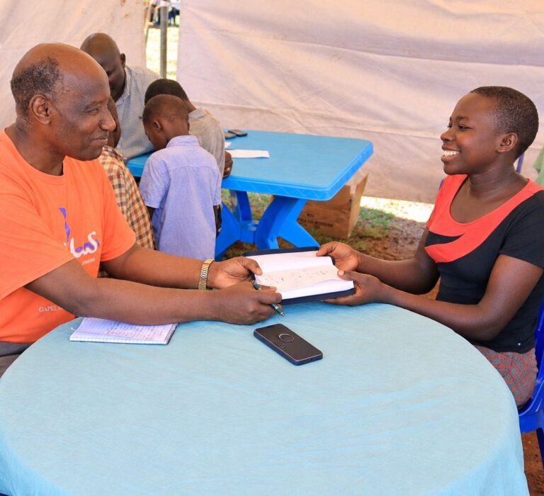 Community Outreach Registration Under a Tent
