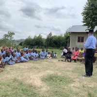 9-15-22_Visiting Kaccumu School Children19-Nelson sharing