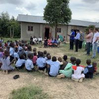 9-15-22_Visiting Kaccumu School Children23-Pastor Daniel sharing