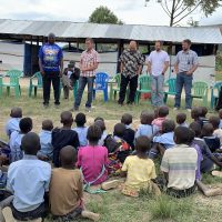 9-15-22_Visiting Kaccumu School Children26-Lester sharing
