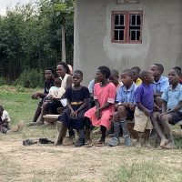 9-15-22_Visiting Kaccumu School Children46-Nelson sharing