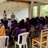 9-9-22_169_Ebenezer House-Giving Bibles to Older Girls