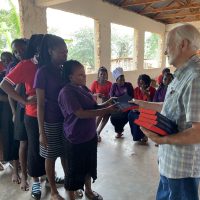 9-9-22_181_Ebenezer House-Giving Bibles to Older Girls